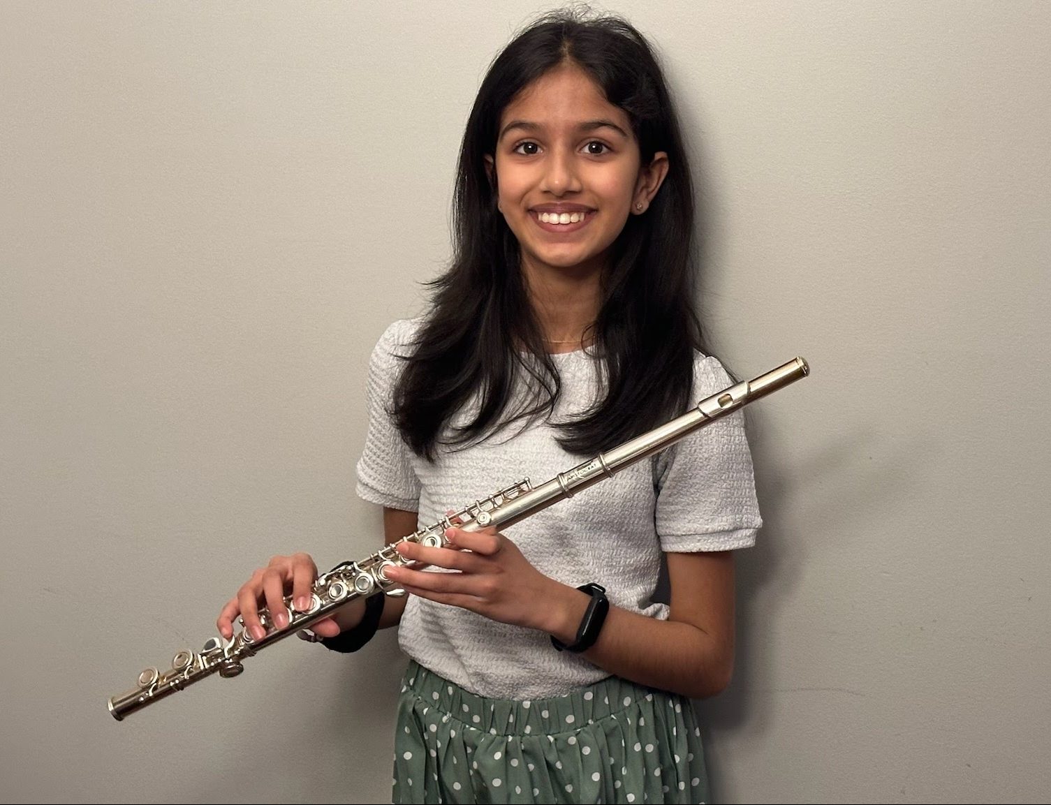 Aradhya Raul Jain holding her flute