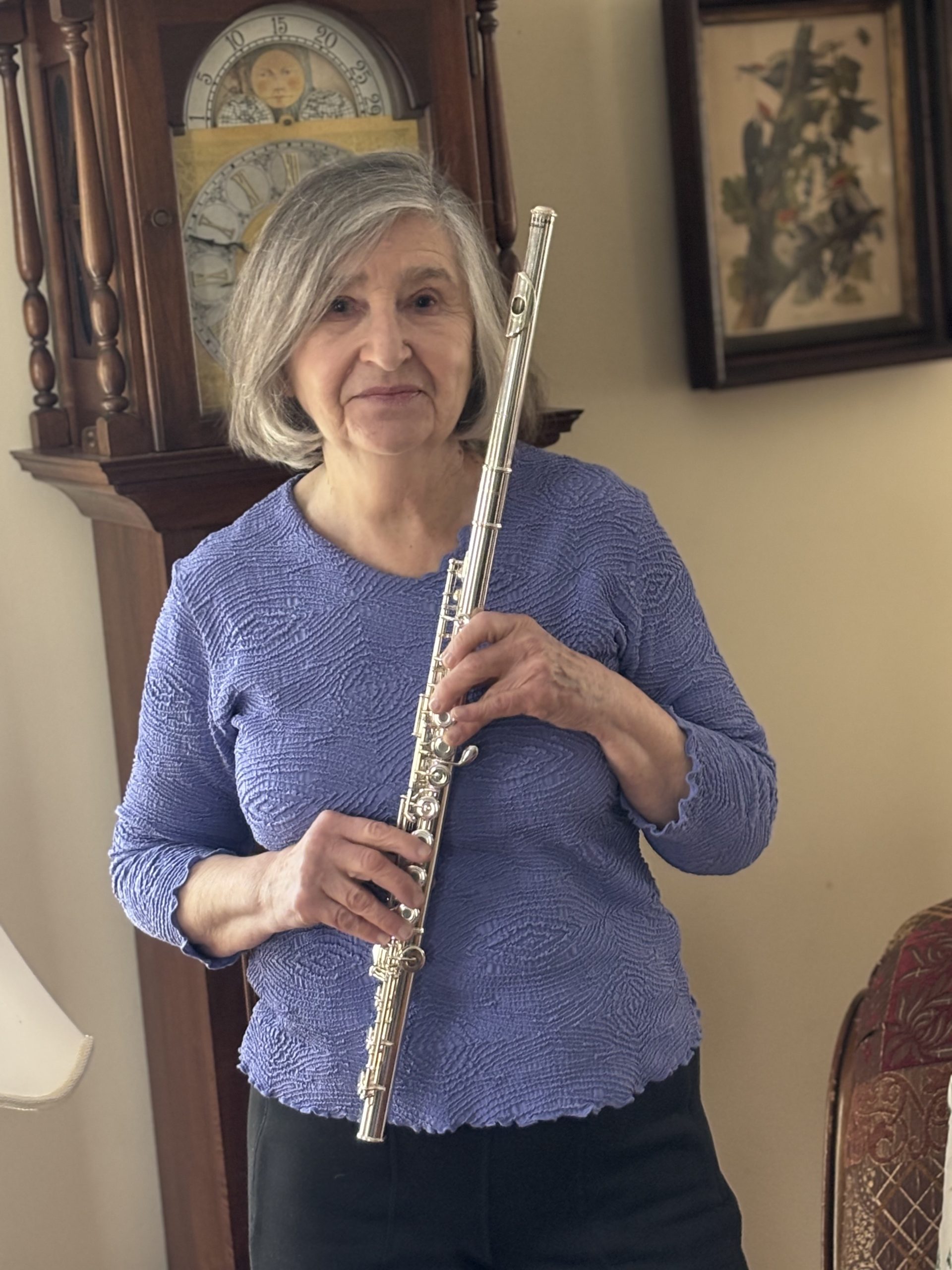 Nance Hahn holding her flute