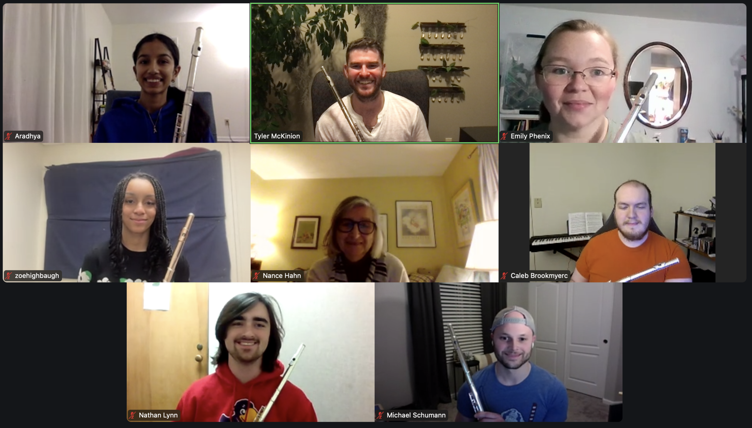 Several students meet with Tyler in a group studio class